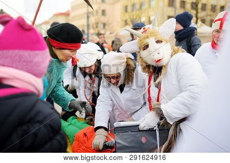 Vilnius, Lithuania - February 25, 2017: Hundreds Of People Celebrating Uzgavenes, A Lithuanian Annua
