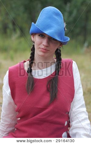 KIEV, UKRAINE - JULY 31: Member of history club Golden Capricorn wears medieval costume as she participates in historical festival in memory of King Vladimir July 31, 2009 in Kiev, Ukraine.