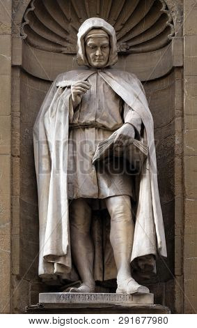 FLORENCE, ITALY - JANUARY 09, 2019: Statue of Giovanni Villani, Italian banker, official, diplomat and chronicler, Loggia del Mercato in Florence, Italy