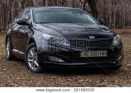 Krivoy Rog, Ukraine - March 2, 2019: Photo Of Black Kia Optima K5 In The Park.