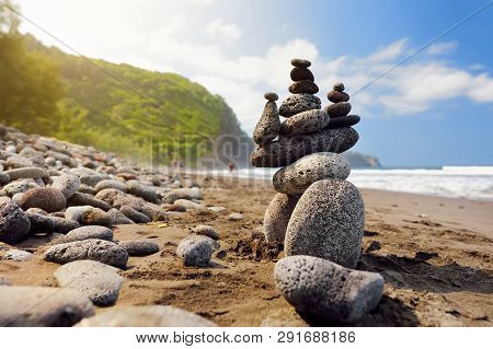 Stack Of Stones Balanced On Rocky Beach Of Pololu Valley, Big Island, Hawaii