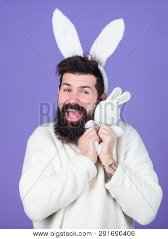 Man Handsome Face Wear White Bunny Ears. Easter Bunny. White Bunny Symbol Of Easter Holiday. Soft An