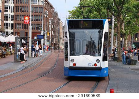 Amsterdam, Netherlands - July 10, 2017: People Ride The Gvb Electric Tram (combino Model Made By Sie