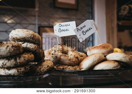 Close Up Of A Variety Of Bagels On Sale, Selective Focus.