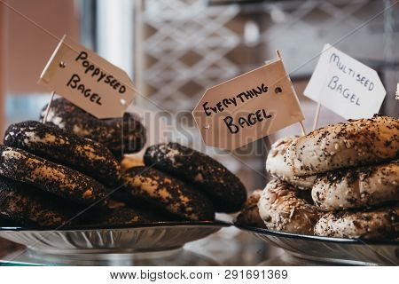 Close Up Of A Variety Of Bagels On Sale, Selective Focus.
