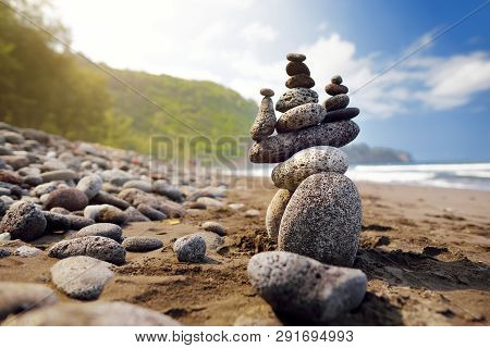 Stack Of Stones Balanced On Rocky Beach Of Pololu Valley, Big Island, Hawaii, Usa