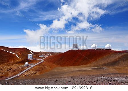 Observatories On Top Of Mauna Kea Mountain Peak. Astronomical Research Facilities And Large Telescop
