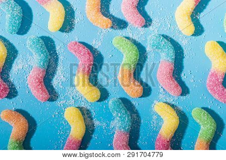 Background Of Colorful Candy. Multicolored Marmalade On A Blue Background. Background Pastel Colors.