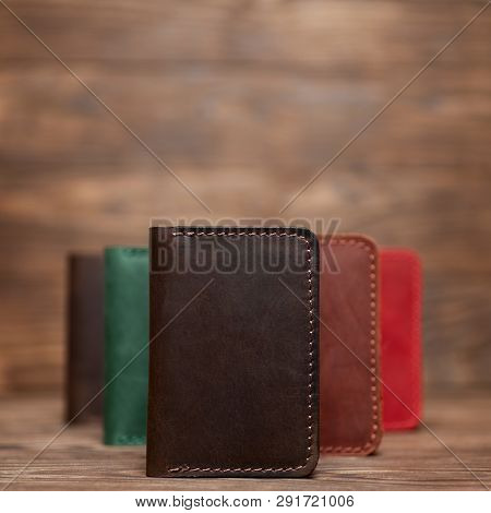 Soft Focus Photo Of Brown Colour Handmade Leather Cardholder. Blurred Background On Photo. Different