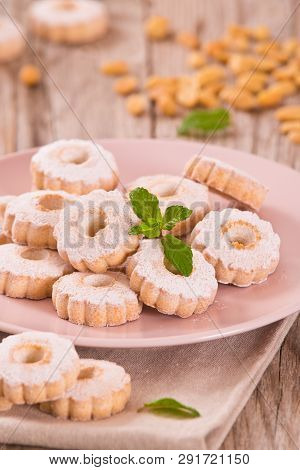 Canestrelli Biscuits With Mint On Wooden Table.