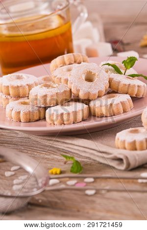 Canestrelli Biscuits With Mint On Wooden Table.