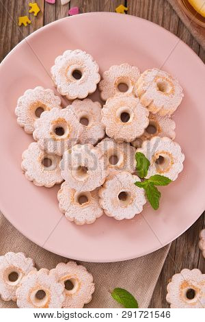 Canestrelli Biscuits With Mint On Wooden Table.