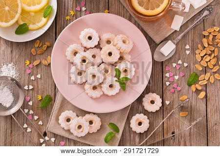 Canestrelli Biscuits With Mint On Wooden Table.