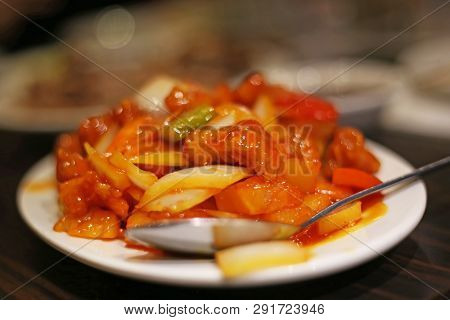Close Up Of Traditional Chinese Food With Duck And Sweet Sour Sauce