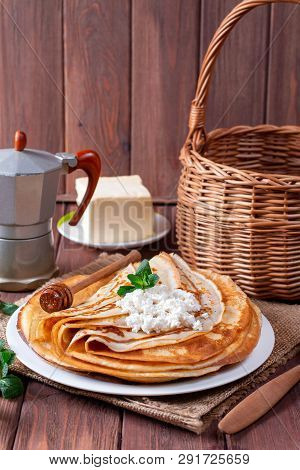Curd Thin Pancakes On A White Plate. Stack Of Crepes, Russian Blin. Tasty Breakfast. Food Photograph