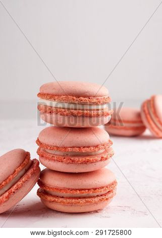 Stack With Pink Macarons On Texutured Background