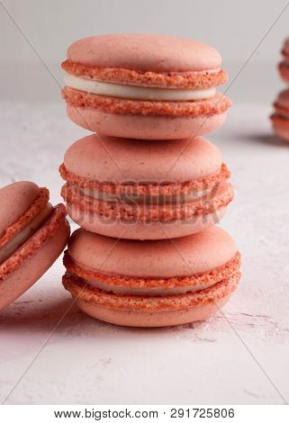 Stack With Pink Macarons Biscuits On White Texutured Background