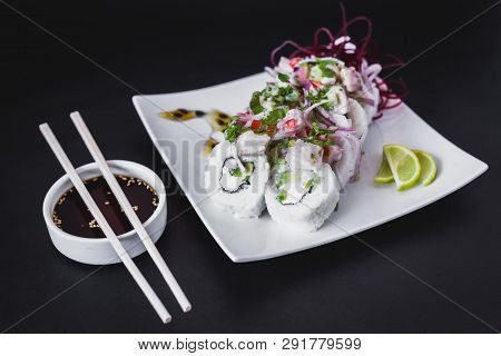 Nikkei Ceviche Roll On A Dark Table