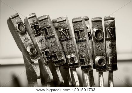 the word  OPINION with old typwriter keys  monochrome