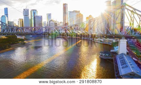 Brisbane, Australia - February 22 2019: Sunset Rays Through Brisbane Cityscape, Elevated View With T
