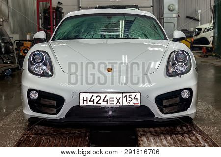 Novosibirsk, Russia - 08.01.18: Front View Of Luxury Very Expensive New White Porsche Cayman Coupe S