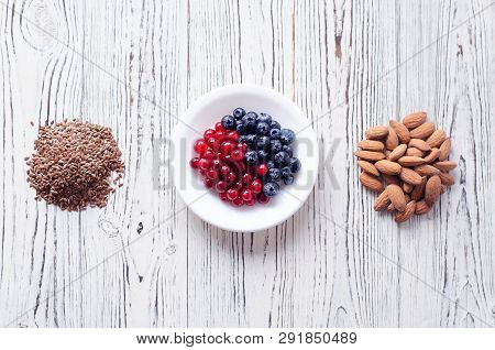 Fletley From Healthy And Wholesome Food. Namely, These Are Berries, Sesame And Migdal.