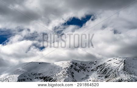 Snowy Hills In Low Tatras Mountains. Winter Peaks Landscape And Clouds On The Sky