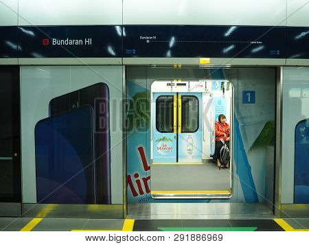 Jakarta, Indonesia - March 23, 2019: People Getting On The Train At Bundaran Hi Mrt Station.