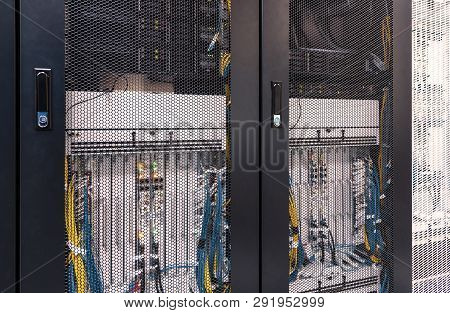 View On The Grid Server-side Doors With Equipment Of The Mobile Connection Hardware Inside. Red Toni