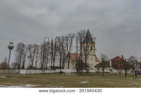Lomnice Nad Luznici Old Town With Church In Cold Dark Winter Day