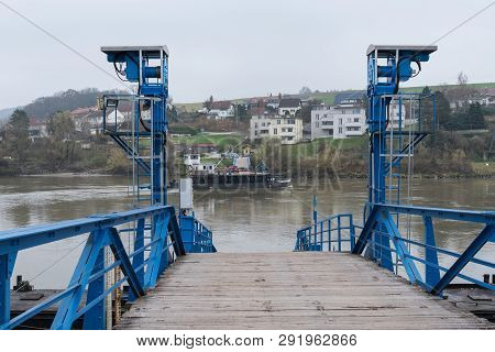 Old Ship Landing Stage With Car Ferry On The Danube