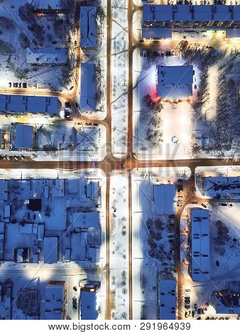 Aerial View Of Town Lodeynoe Pole, City In The Evening, Winter Cityscape, Russia.