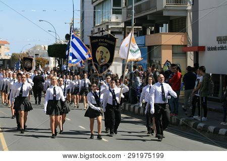 Limassol, Cyprus, March 25th, 2019: High School Students In Uniform Marching Along The Archbishop Ma