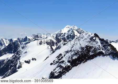 Mountain Wildspitze, Snow Panorama And Blue Sky In Tyrol Alps, Austria
