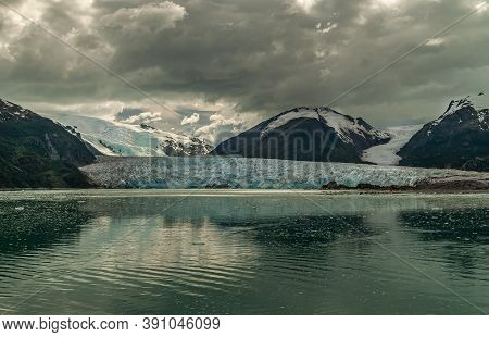 Sarmiento Channel, Chile - December 11, 2008: Amalia Glacier. Landscape Of Blueish Melting Point At 