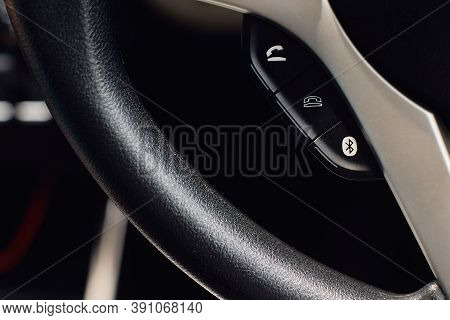 Close-up Photos Of Sterring Wheel With Bluetooth And Phone Calling Control Buttons.