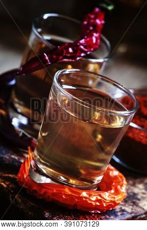 Traditional Ukrainian Vodka With Pepper Gorilka, Dark Vintage Wooden Background, Rustic Style, Selec