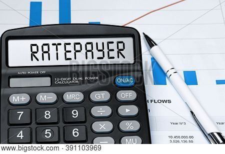 Calculator With The Word Ratepayer On The Display. Money, Finance And Business Concept