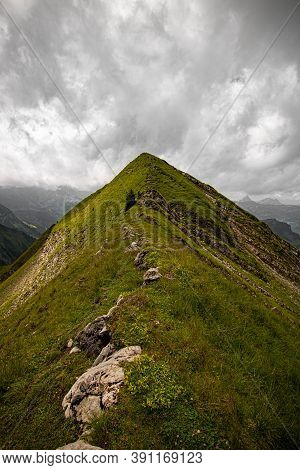 Landscape With Swiss Alps Mountains And Green Nature. Photo Taken At Fluebrig.