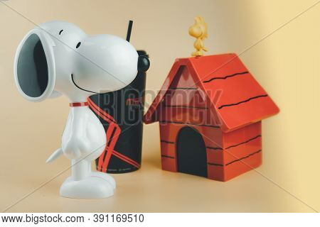 Samut Prakan, Thailand - October 23, 2020 : Set Of Popcorn Bucket And Drink Cup Of Cartoon Snoopy An