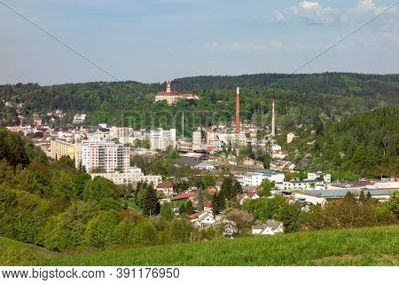 Landscape Of Nachod City In Bohemia, Czech Republic With A Chateaux In The Background
