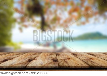 Empty Wooden Table With Sea Scape Islands Blurred Background For Product Display.