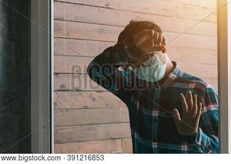 Depressed Crying Asian Business Man Sad In The Mirror With Headache. Coronavirus Covid-19 Impact On 