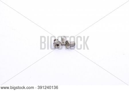 Opening Of Hard Disk For Data Recovery Isolated On White Background. Dismantled Hard Drive. Screwdri