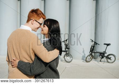Cute Young Couple Hugging, Kissing. On A Sunny Autumn Day.