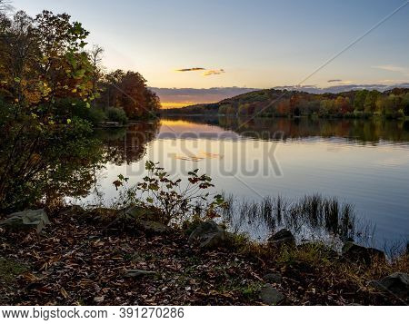 Sunset Over Keystone Lake In West Moreland Country In The Laurel Highlands Of Pennsylvania In The Fa