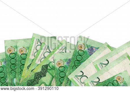 2000 Kazakhstani Tenge Bills Lies On Bottom Side Of Screen Isolated On White Background With Copy Sp