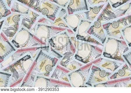 1000 Nepalese Rupees Bills Lies In Big Pile. Rich Life Conceptual Background