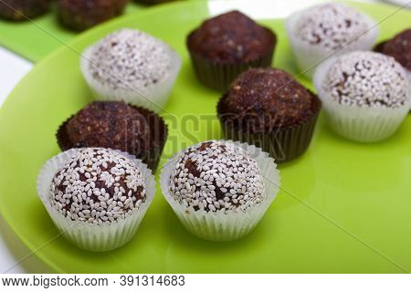 Dried Fruit And Nut Sweets. Some Are Sprinkled With Sesame Seeds. Made At Home In Self-isolation Dur