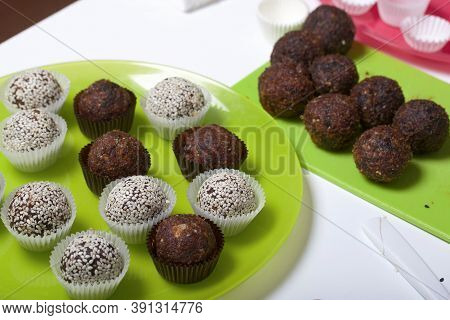 Dried Fruit And Nut Sweets. Some Are Sprinkled With Sesame Seeds. Made At Home In Self-isolation Dur